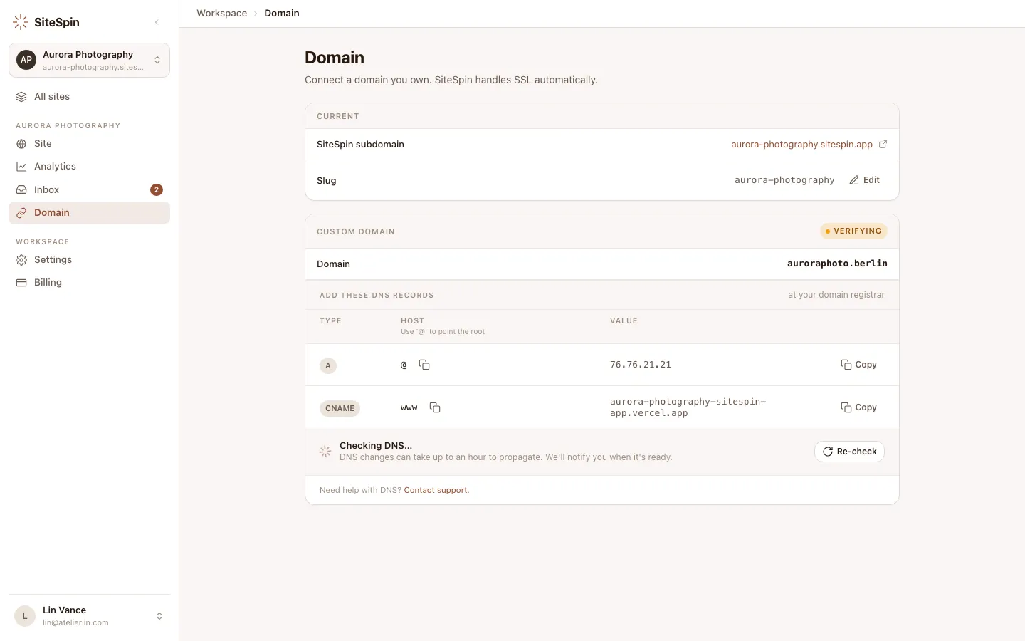 SiteSpin web app domain settings showing the values to copy into your domain provider, each with a copy button, a connecting-status pill, and a 'Re-check' button.